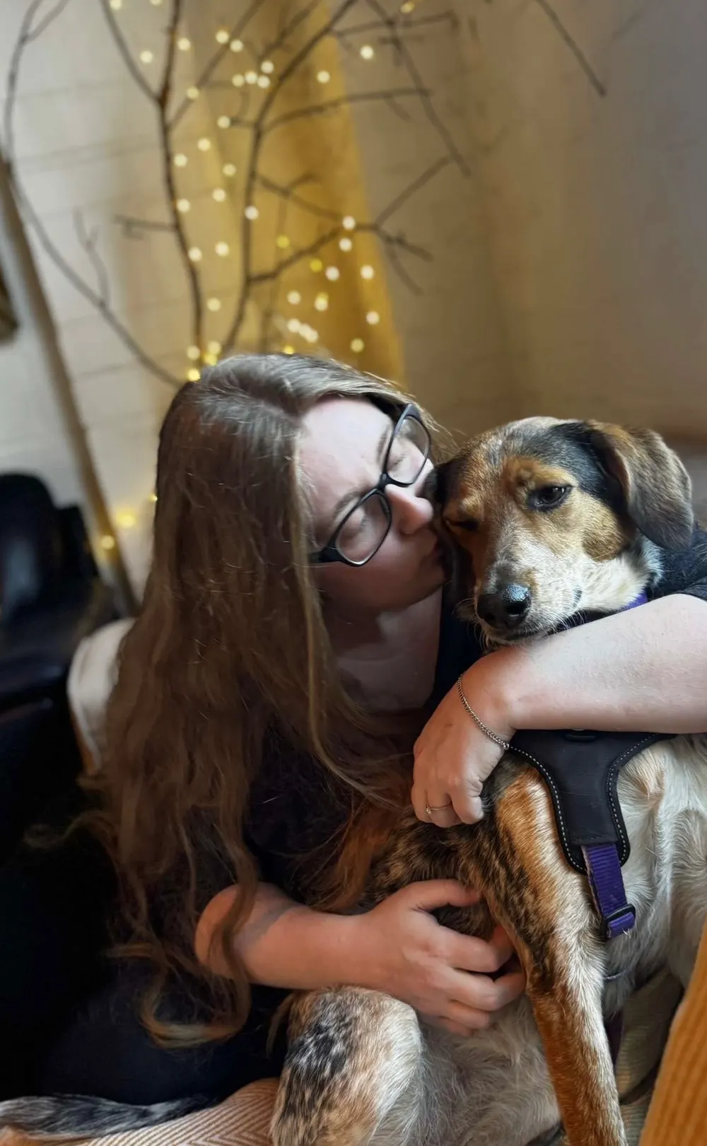 Kiera Knight, company secretary and bookkeeper, hugging Oakleigh